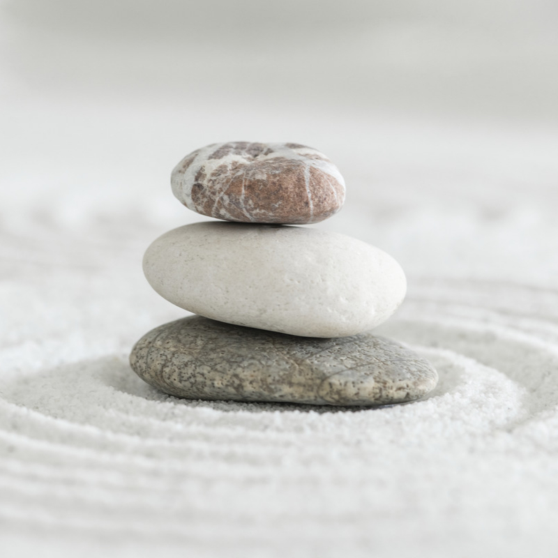 stacked-zen-stones-sand